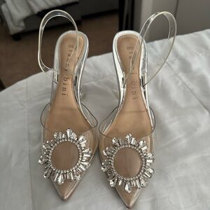 Gianni bini. Size 6. Clear heels with pendant